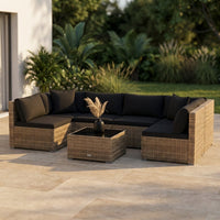 7-Piece Wicker Patio Outdoor Sectional Set Sofa with Cushionguard Black Cushions — Studio Shot