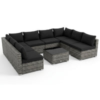 7-Piece Wicker Patio Outdoor Sectional Set Sofa with Cushionguard Black Cushions — Studio Shot
