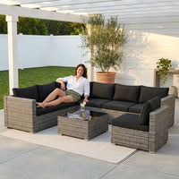 7-Piece Wicker Patio Outdoor Sectional Set Sofa with Cushionguard Black Cushions — Lifestyle