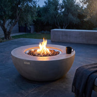 Westport 34 In. X 14 In. Grey round Concrete Propane Pit Table with Electronic Ignition Cover and Lava Rock — Studio Shot